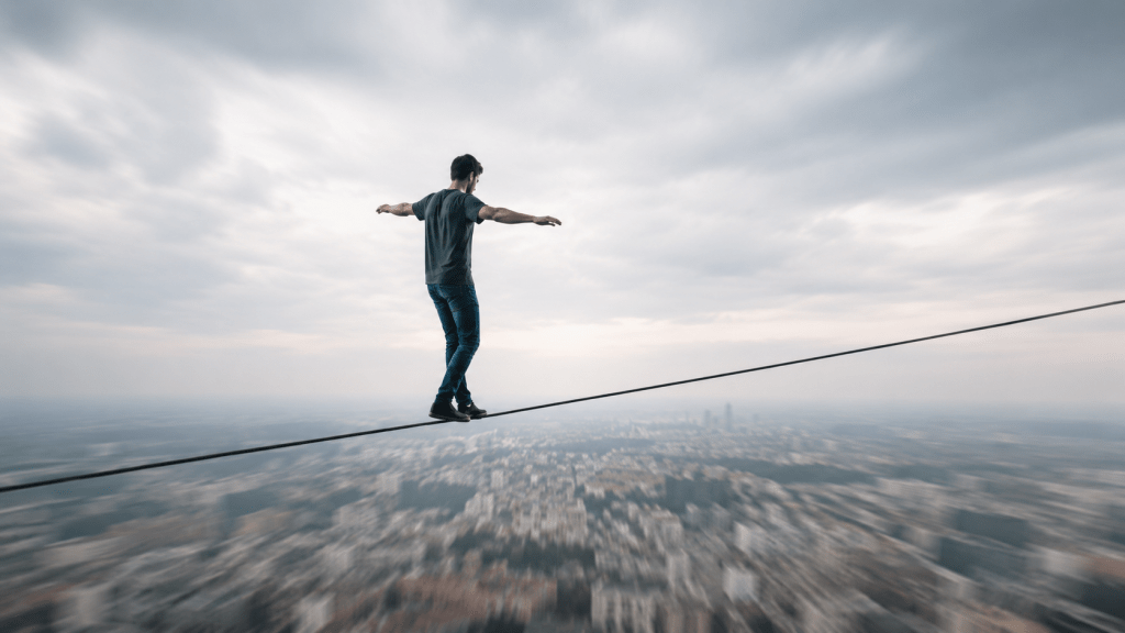 Persona in equilibrio su una fune per rappresentare vertigini e sensazione di instabilità